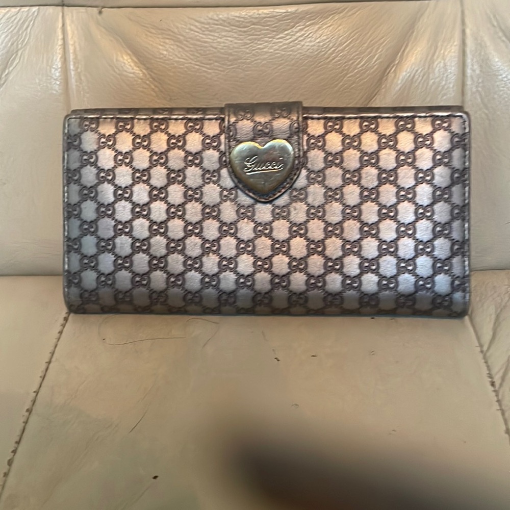 Gucci heart wallet.